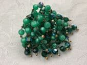 1960s Moonglow Lucite and Austrian Crystal Bead Cascade Brooch - GREEN