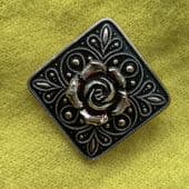 A Square Floral Scarf Clip in a pink toned aluminium - 1950s Rose Scarf Ring