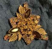A Vintage designer signed SPHINX  Jewelled  Brooch in Autumn Colours