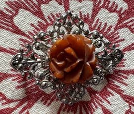 Deep Carved Bakelite Rose Brooch on Chromed Filigree Panel1930 to 1940