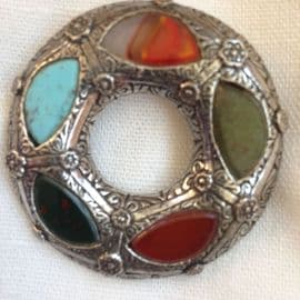 Miracle Brooch in Tudor Style. A Vintage pin set with orange, blue and green jewels. (SOLD)