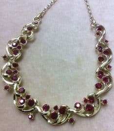 Red Jewelled Necklace by Coro dates to 1960s