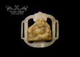 SOLD 1920s Buddha slide buckle in Faux Ivory Celluloid