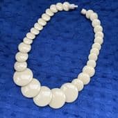SOLD  1970s Ivorine Disc Bead Necklace - Reminiscent of Lea Stein’s Collars