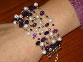 SOLD  A New Multistrand Bracelet with Freshwater Pearls and Amethyst Beads