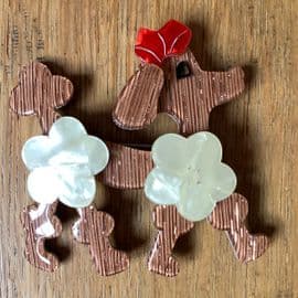 SOLD  Lea Stein Caramel Poodle with White Pom Pom Hairdo and Red Bow