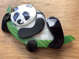 SOLD. A Panda Bear Brooch By Lea Stein of Paris - Black and White Panda on Green Bamboo Branch
