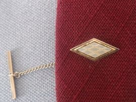 Vintage tie tack with carved mother of pearl decoration circa 1960s (SOLD)