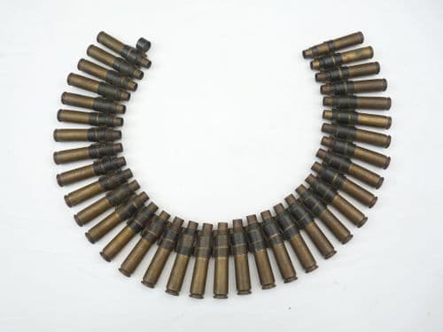 32 linked inert  0.50 cal cartridge cases **SOLD**