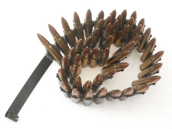 50 linked inert 7.62 x 39mm RPD machine gun cartridges with starter tab.