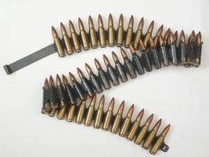 50 linked inert 7.62 x 39mm RPD machine gun cartridges with starter tab.