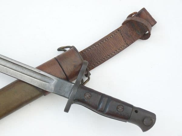 American Remington Model 1917 bayonet, scabbard and Home Guard frog, 1918 marked **SOLD**