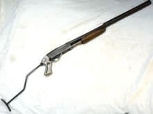 Deactivated Stevens  model 67 pump-action shotgun with moderator SOLD
