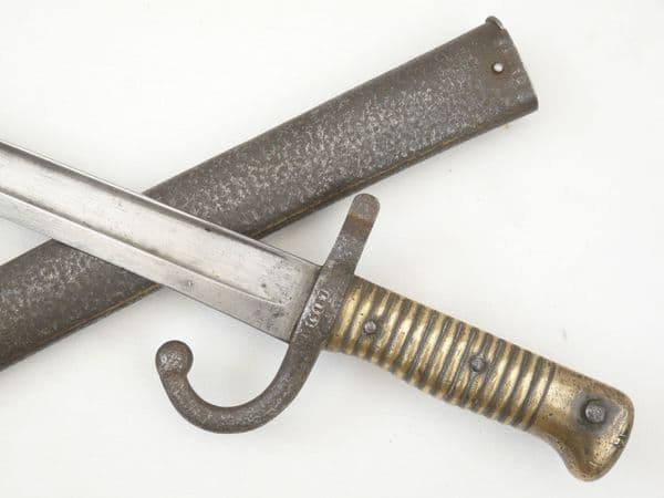 French Chassepot M1866 sword bayonet and scabbard, Mutzig, 1868 dated, matched serial numbers.