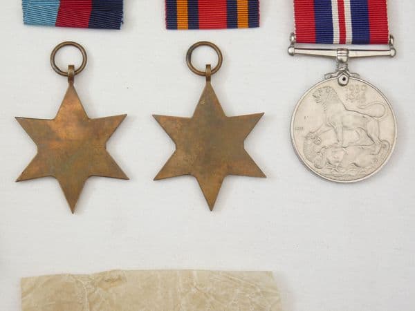Genuine British 3 medal group with certificate to Royal Navy. H.C. Braxler.