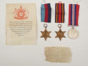Genuine British 3 medal group with certificate to Royal Navy. H.C. Braxler.