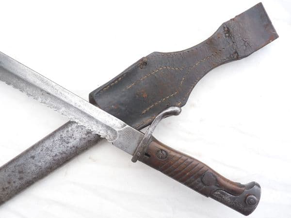 German S1898/05 S n/A 'Butcher sawback' bayonet and scabbard, 1917 dated