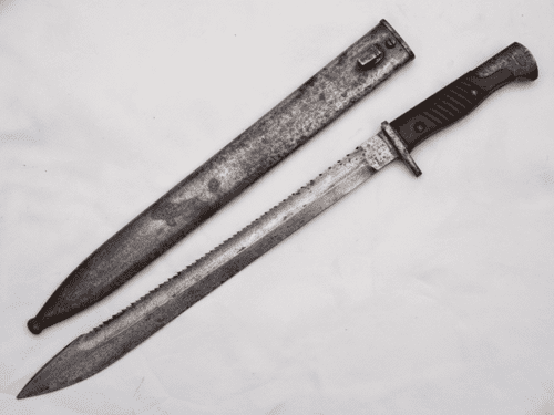German S1898/05 Sawback 'Butcher' bayonet and scabbard, 1916 dated **SOLD**
