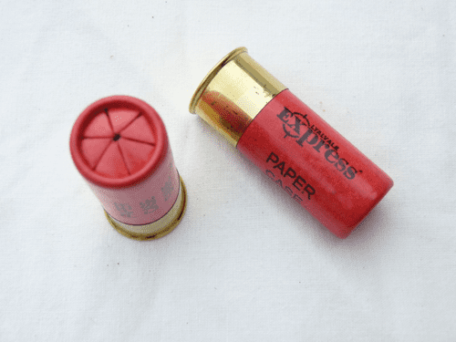 Inert 12 bore cartridge in waxed paper in red, deep brass cap ** OUT OF STOCK**