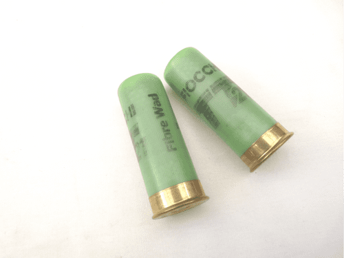 Inert 12 bore cartridge with light green plastic case