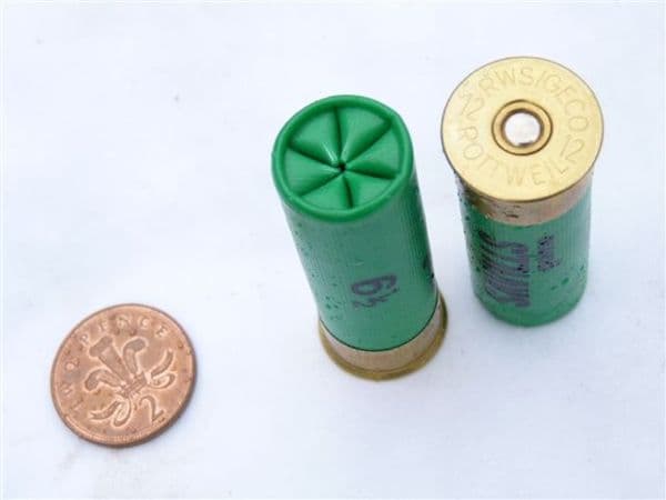 Inert 12 bore cartridge with plastic case in  green