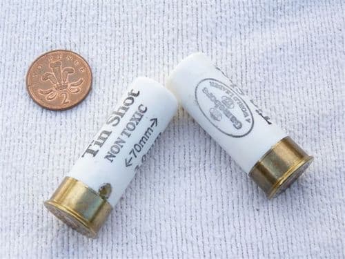 Inert 12 bore cartridge with white plastic casing