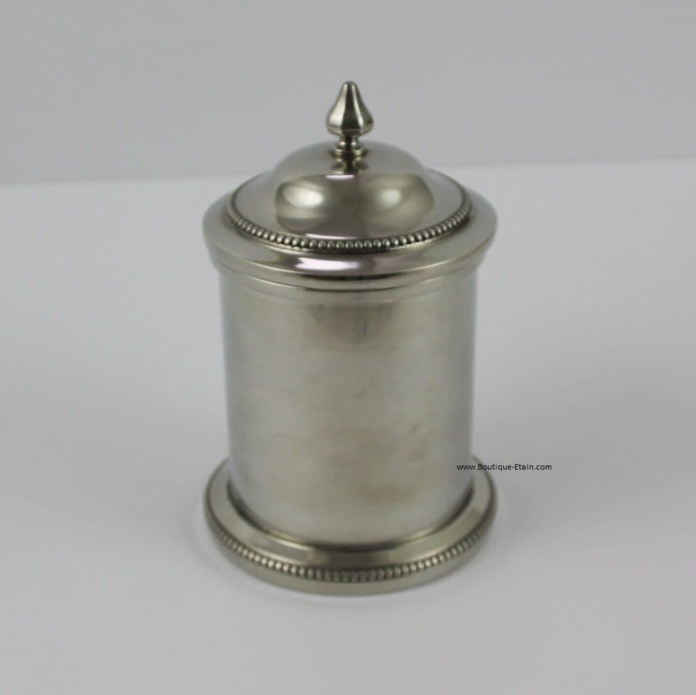 Boîte en étain brillant forme tabatière.