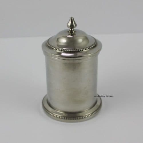 Boîte en étain brillant forme tabatière.