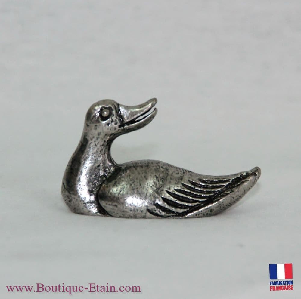 Canard tête tournée en étain