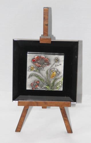 Chevalet fleuri en étain et miroir