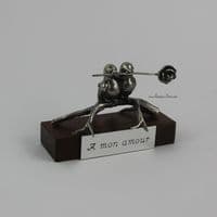 Couple d'oiseaux en étain sur socle bois