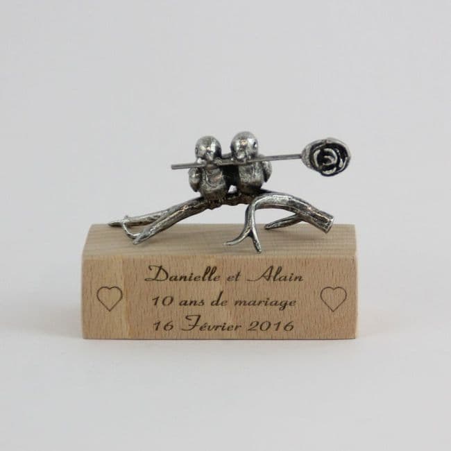 Couple d'oiseaux en étain sur socle bois clair