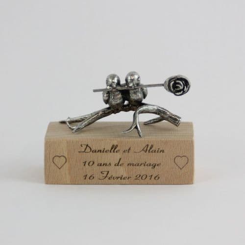 Couple d'oiseaux en étain sur socle bois clair
