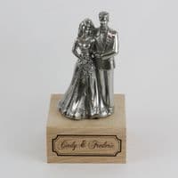 Couple de mariés en étain brillant