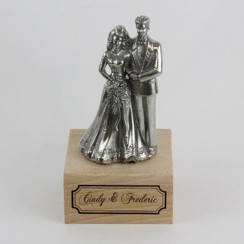 Couple de mariés en étain brillant