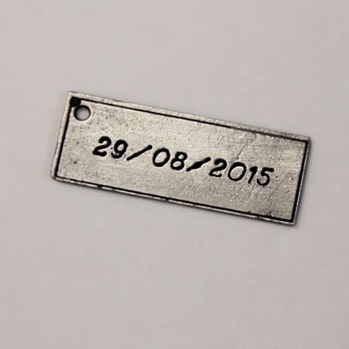 Etiquette gravée en étain