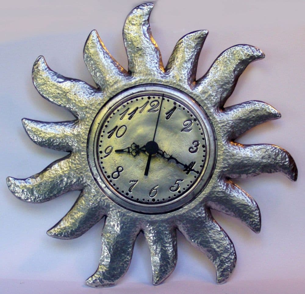 Horloge, pendule Soleil en étain