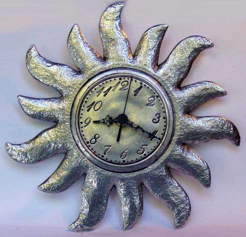 Horloge, pendule Soleil en étain