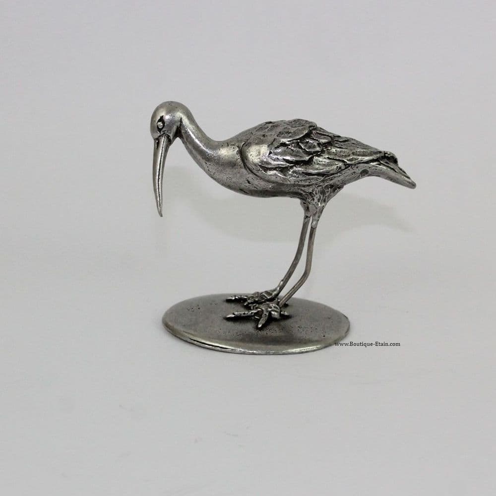 La grande cigogne ou héron en étain