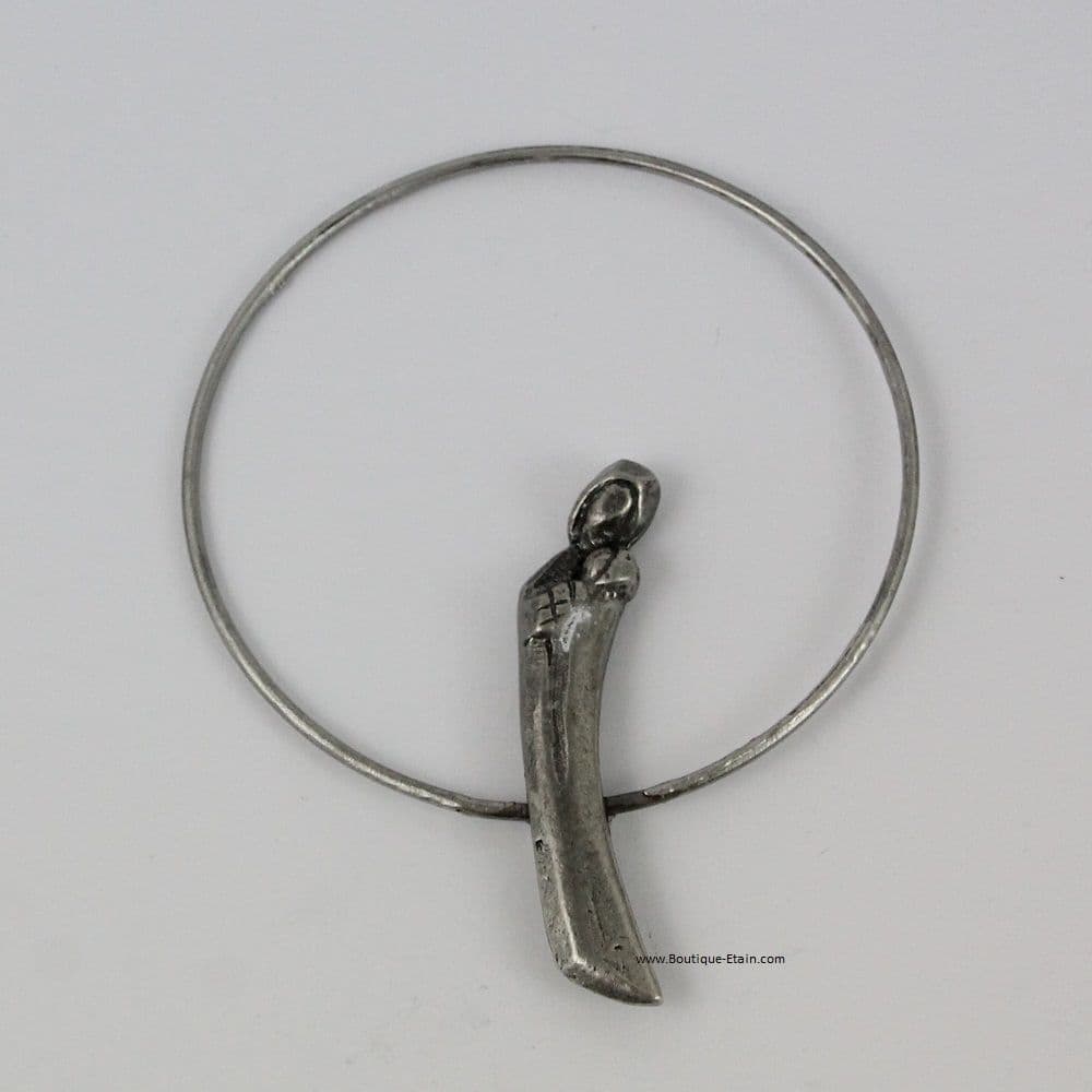 La Vierge Marie et Jésus dans un cercle d'étain
