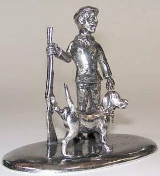 Le chasseur et son chien en étain