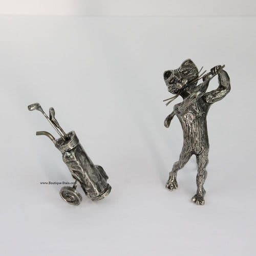 Le grand chat golfeur et son caddy en étain