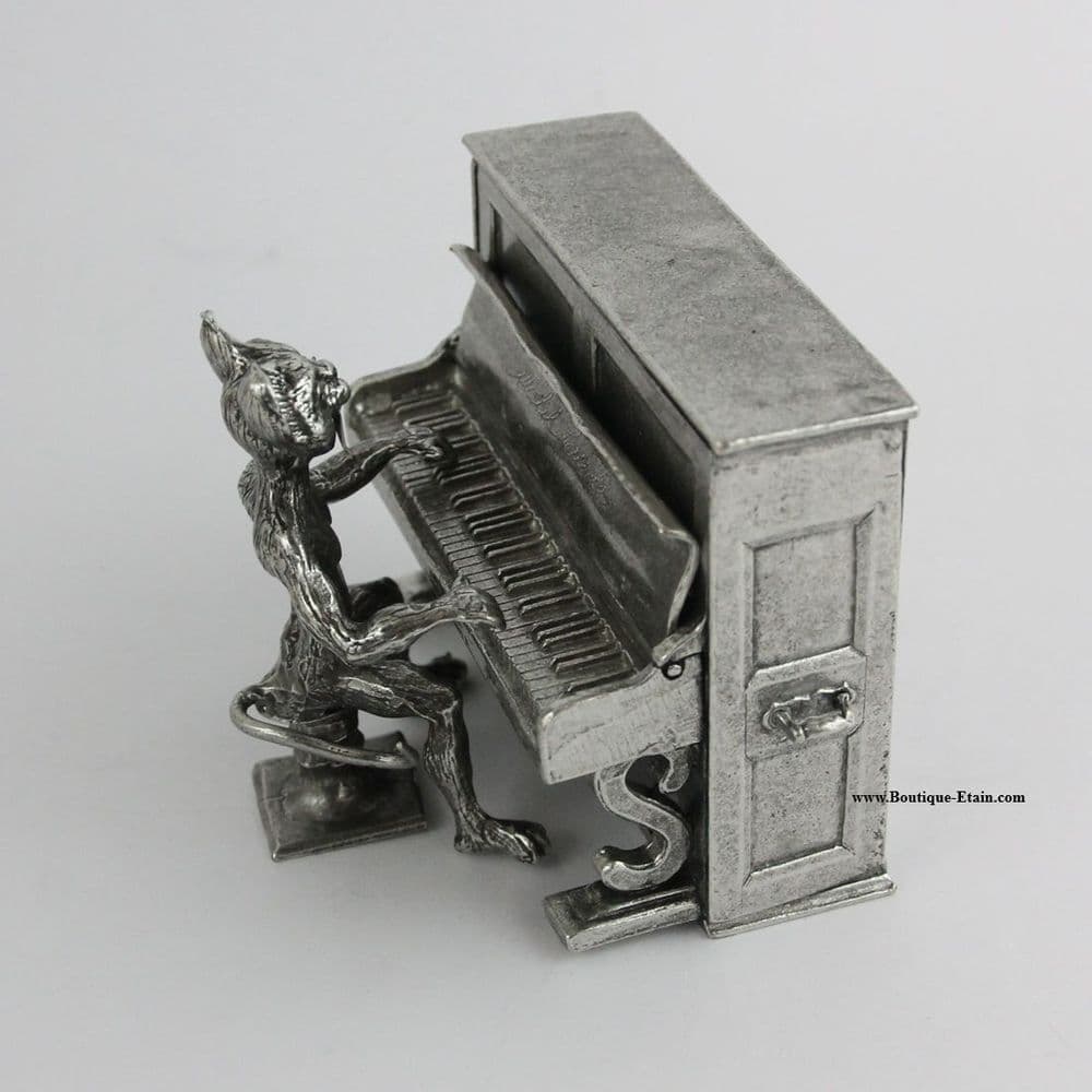 Le grand chat pianiste, le piano en étain