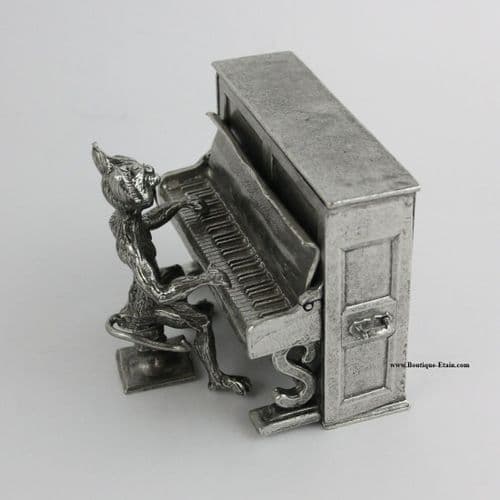 Le grand chat pianiste, le piano en étain