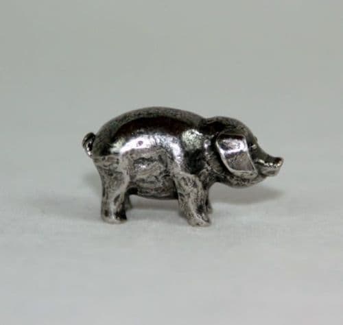 Le petit cochon en étain