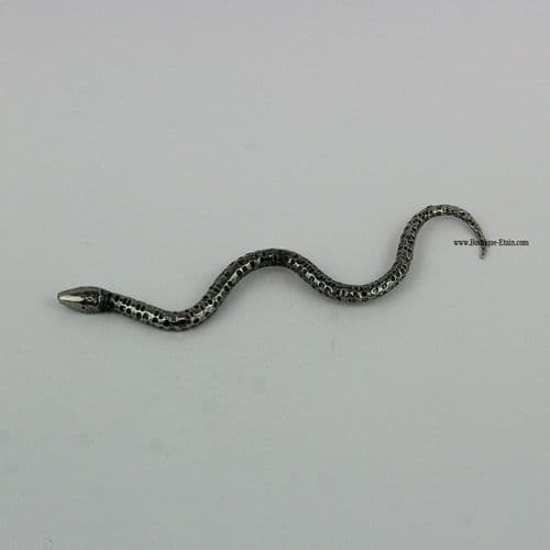 Le serpent en étain