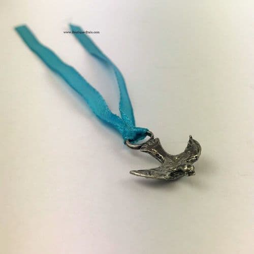 Médaille oiseau ( colombe ou hirondelle ) en étain.