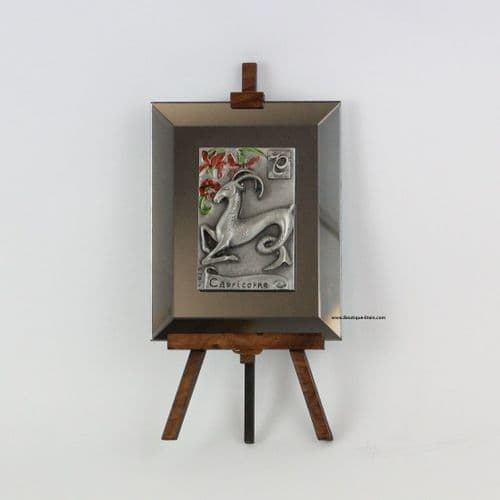 Miroir sur chevalet décor Capricorne en étain