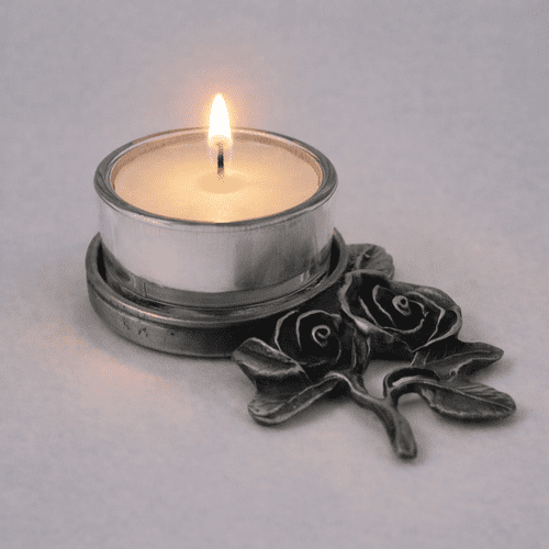 Petit bougeoir en étain motif rose