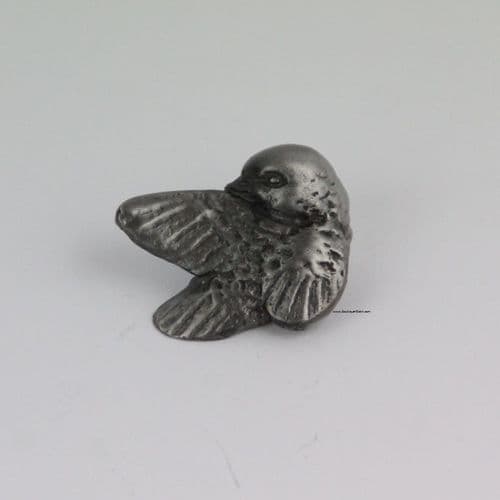 Petit oiseau en étain